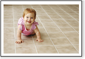 Baby crawling on Tile Floor